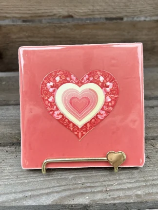 Tegeltje met een roze hart