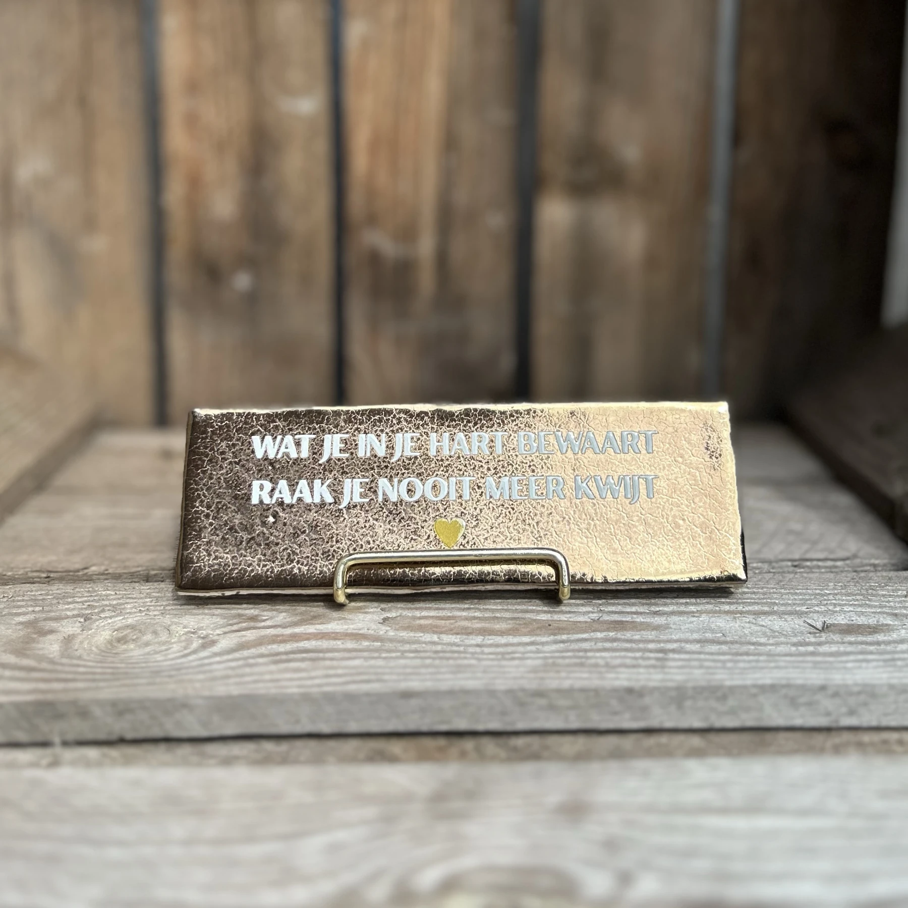 Wat je in je hart bewaart raak je nooit meer kwijt / brons (Langwerpig tegeltje)